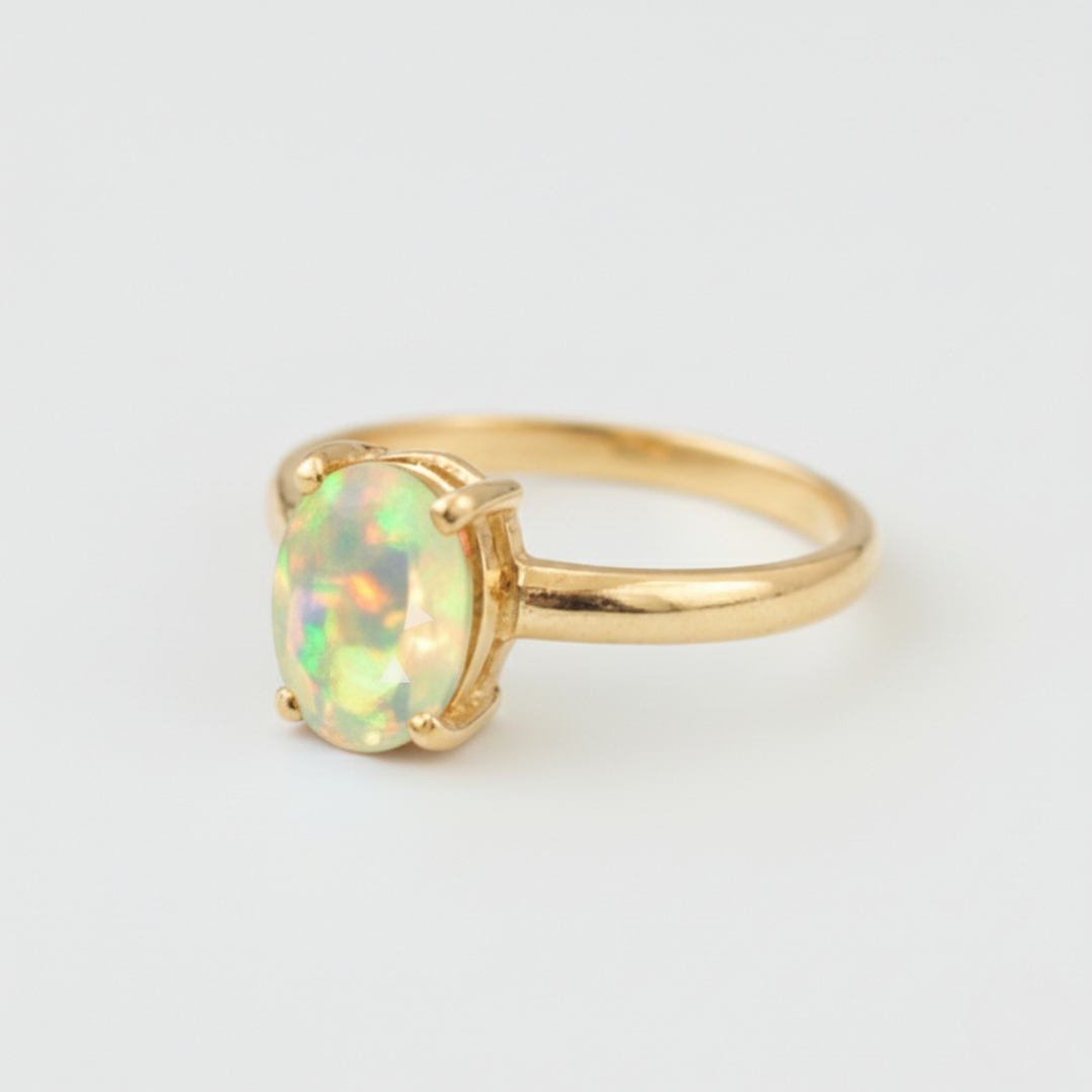 Stunning Gold Opal Ring - Timeless Solitaire Design in 18k Gold Vermeil, ideal for special celebrations and everyday elegance.