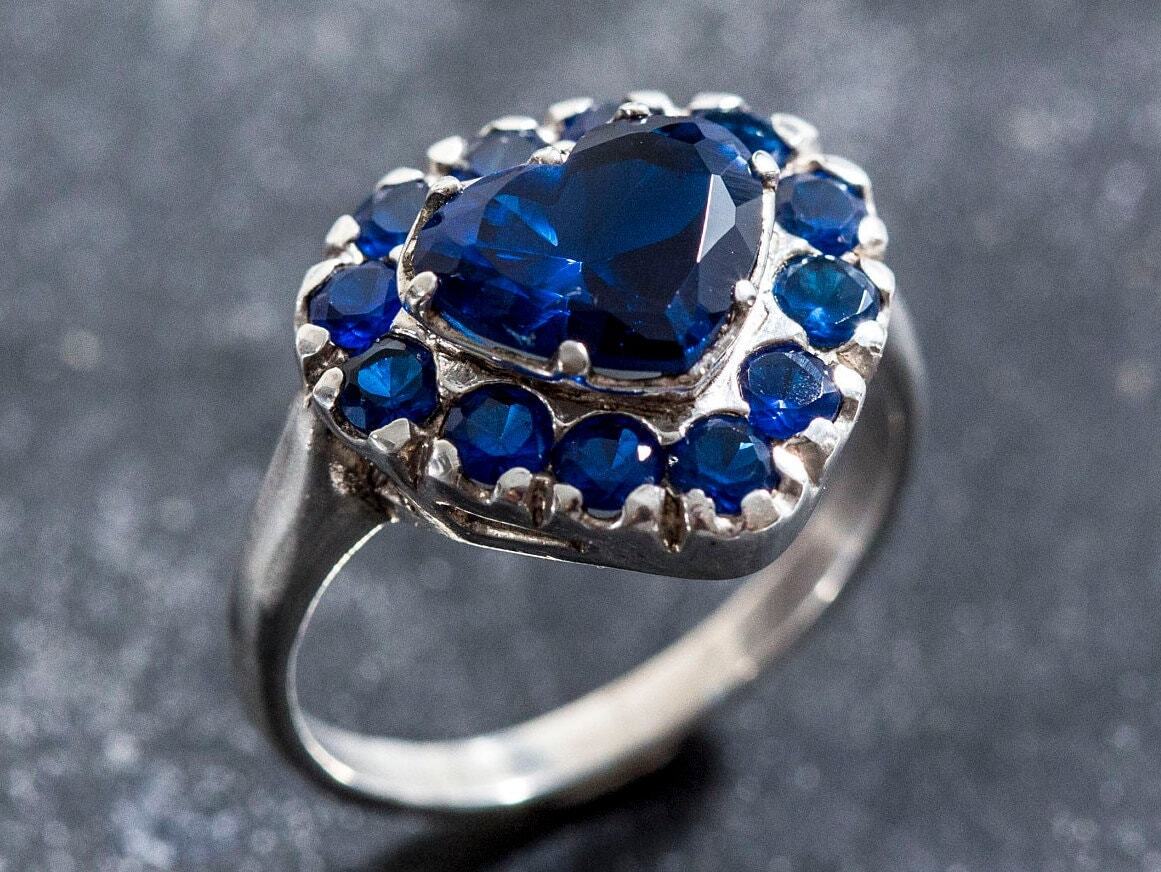 Created Sapphire Ring made in 925 Sterling Silver with Heart Created Blue Sapphire in Halo setting, September Birthstone gift idea, symbolizes sincerity, truth, and faithfulness, ideal for everyday wear and perfect for birthday gifting and special occasions.