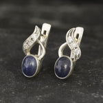 Natural Sapphire Earrings made in 925 Sterling Silver with Oval Natural Blue Sapphire in Bezel setting, September Birthstone gift idea, symbolizes sincerity, truth, and faithfulness, ideal for everyday wear and perfect for birthday gifting and special occasions.