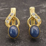 Natural Sapphire Earrings made in 18k Gold Vermeil with Oval Natural Blue Sapphire in Bezel setting, September Birthstone gift idea, symbolizes sincerity, truth, and faithfulness, ideal for everyday wear and perfect for birthday gifting and special occasions.