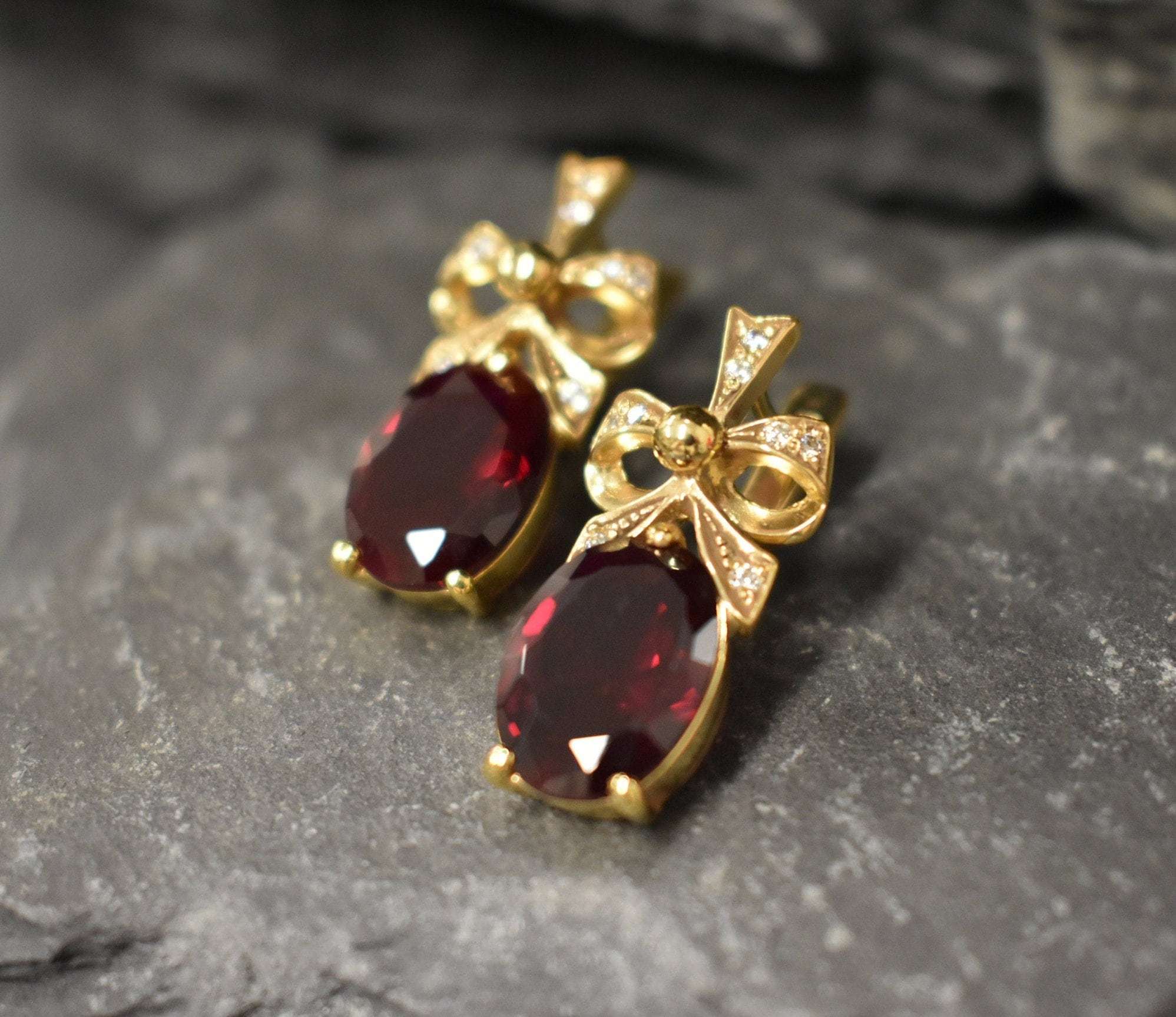 Created Ruby Earrings made in 18k Gold Vermeil with Oval Created Red Ruby in Solitaire with Accents setting, July Birthstone gift idea, symbolizes nobility, purity, and passion, ideal for everyday wear and perfect for birthday gifting and special occasions.