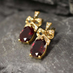 Created Ruby Earrings made in 18k Gold Vermeil with Oval Created Red Ruby in Solitaire with Accents setting, July Birthstone gift idea, symbolizes nobility, purity, and passion, ideal for everyday wear and perfect for birthday gifting and special occasions.