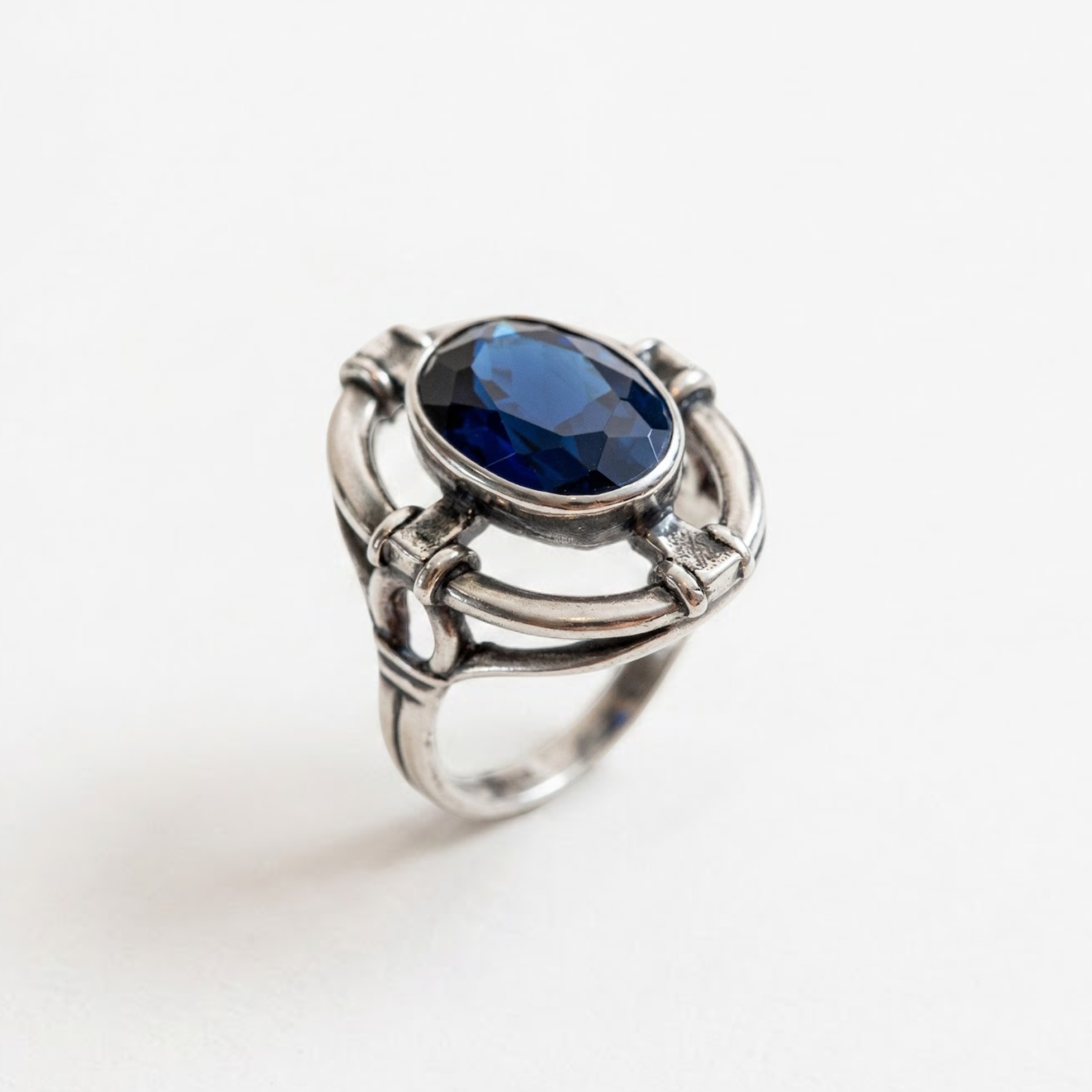 Created Sapphire Ring made in 925 Sterling Silver with Oval Created Blue Sapphire in Bezel setting, September Birthstone gift idea, symbolizes sincerity, truth, and faithfulness, ideal for everyday wear and perfect for birthday gifting and special occasions.