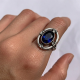 925 Sterling Silver Sapphire Ring featuring a dazzling oval Created Blue Sapphire, perfect for September birthdays and special occasions.