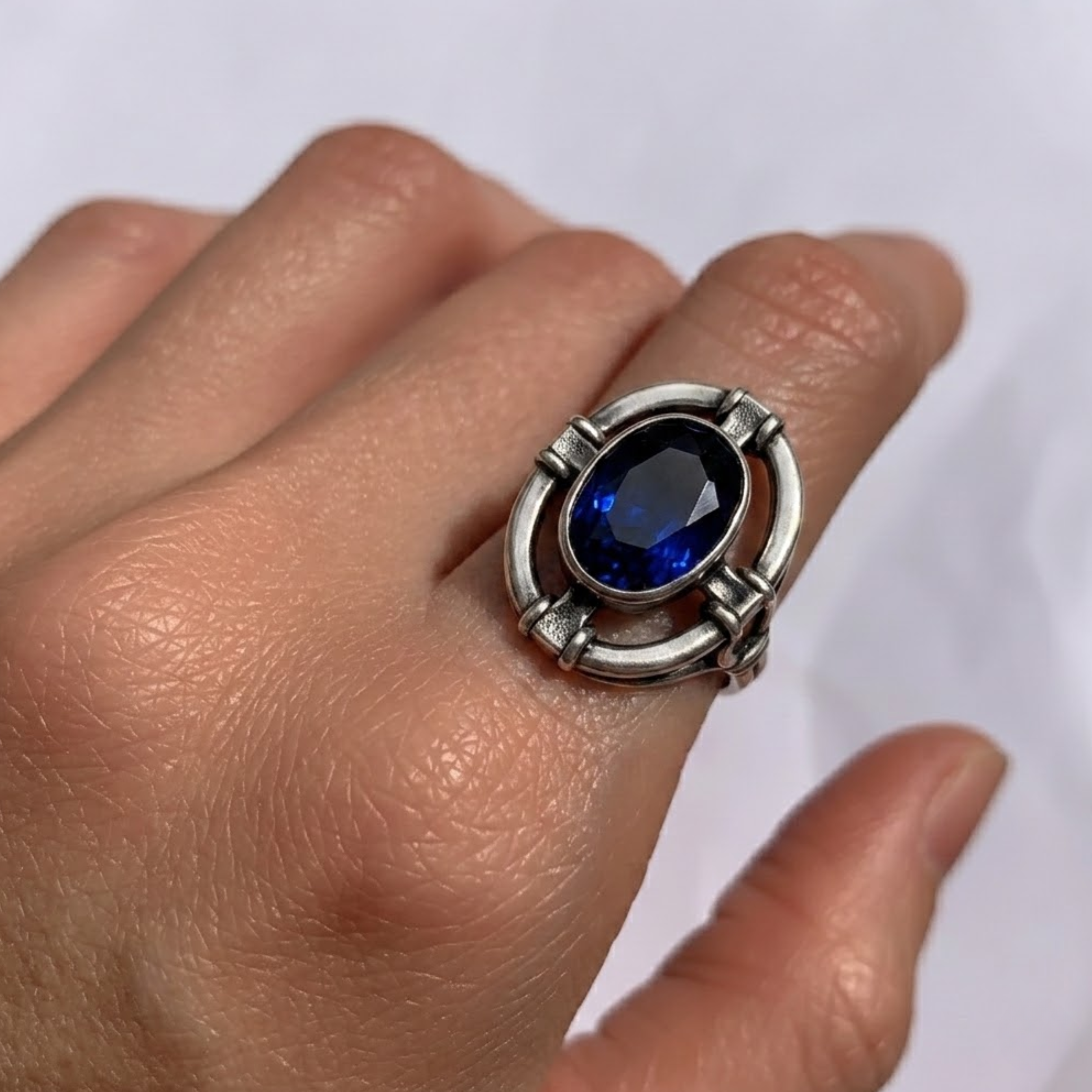 925 Sterling Silver Sapphire Ring featuring a dazzling oval Created Blue Sapphire, perfect for September birthdays and special occasions.