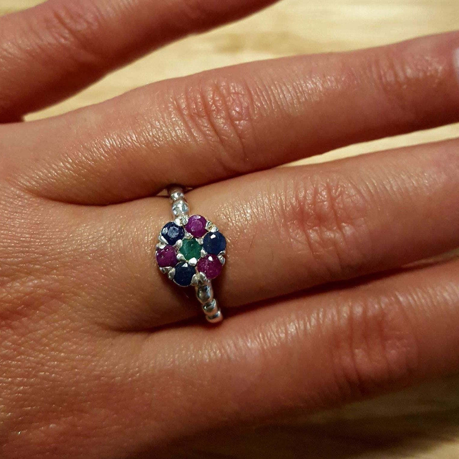 Elegant 925 Sterling Silver ring featuring a cluster of Round Natural Blue Sapphires, perfect for special occasions.