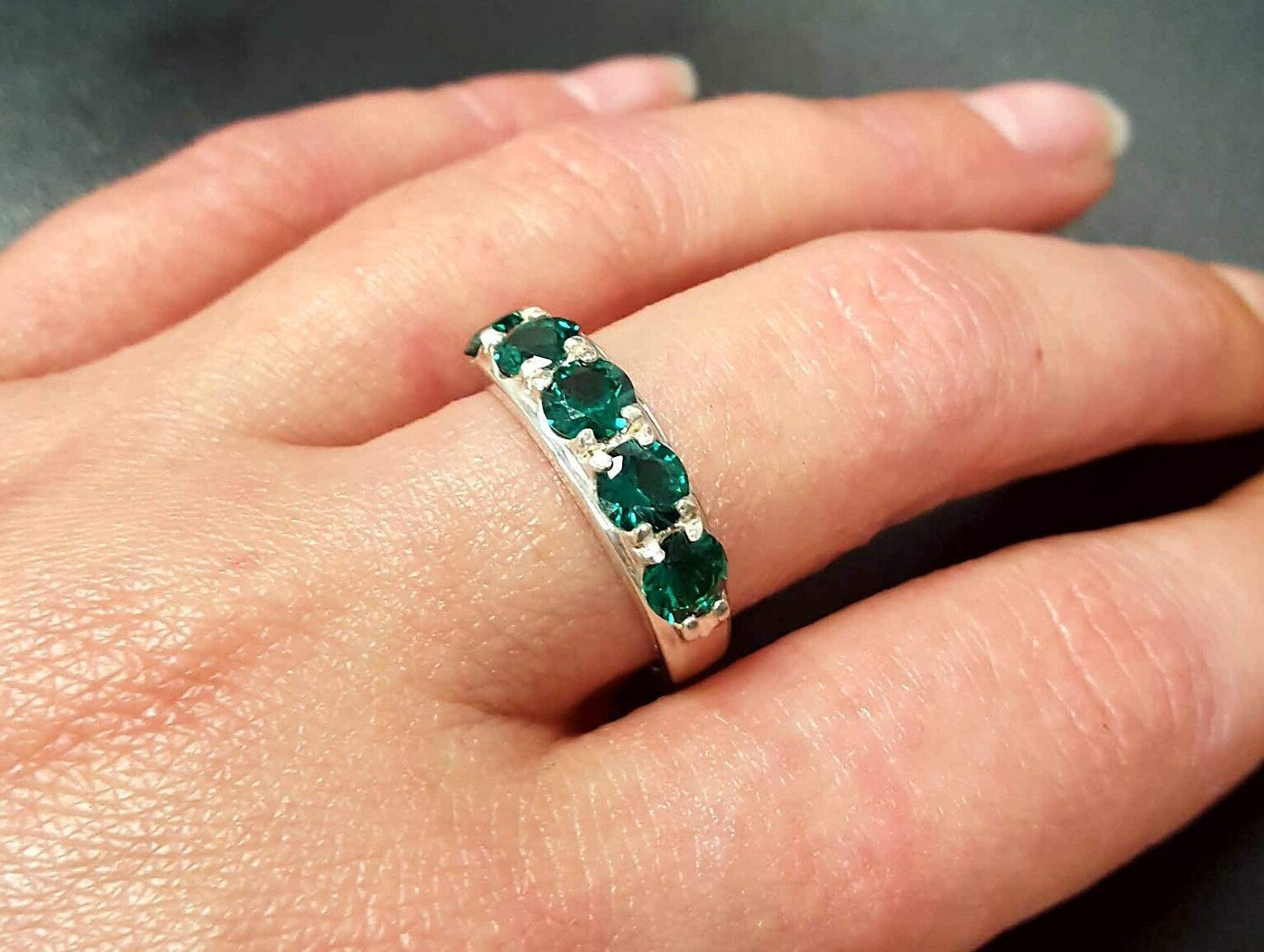 Elegant 925 Sterling Silver ring featuring a vibrant Created Emerald, perfect for May birthdays and special occasions.