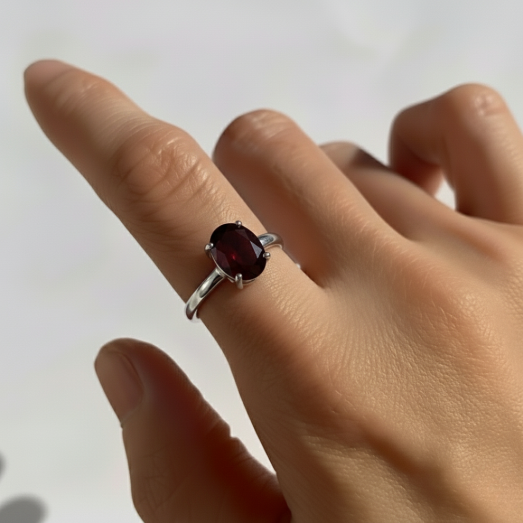 Elegant 925 Sterling Silver ring featuring a prong-set Natural Red Garnet, perfect for everyday wear and special occasions.