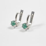 Stylish round natural emerald earrings in 925 sterling silver, symbolizing harmony—great for special occasions and daily use.