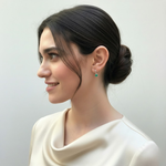 Chic prong-set natural emerald earrings in 925 sterling silver, ideal for May birthdays and adding elegance to any outfit.