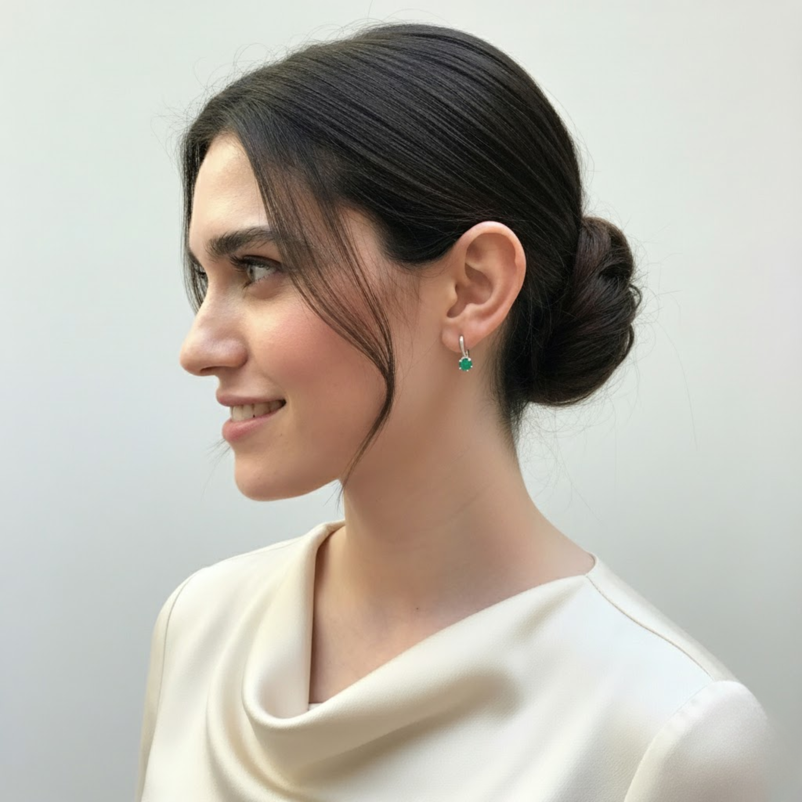 Chic prong-set natural emerald earrings in 925 sterling silver, ideal for May birthdays and adding elegance to any outfit.