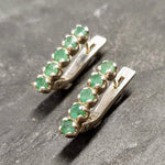 Natural Emerald Earrings made in 925 Sterling Silver with Round Natural Green Emerald in Channel-Set setting, May Birthstone gift idea, symbolizes growth, harmony, and deep emotional healing, ideal for everyday wear and perfect for birthday gifting and special occasions.