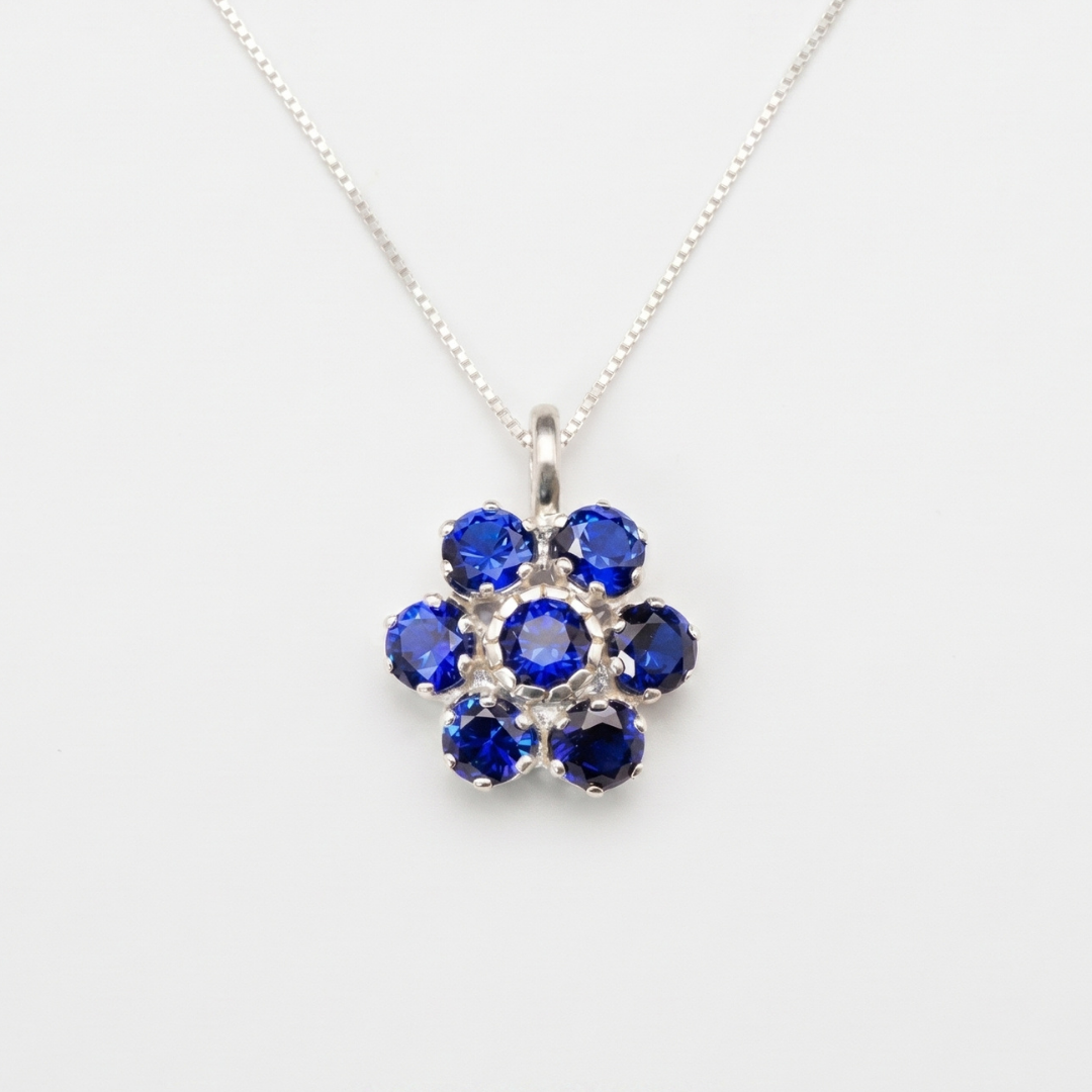 Created Sapphire Pendant made in 925 Sterling Silver with Round Created Blue Sapphire in Cluster setting, September Birthstone gift idea, symbolizes sincerity, truth, and faithfulness, ideal for everyday wear and perfect for birthday gifting and special occasions.