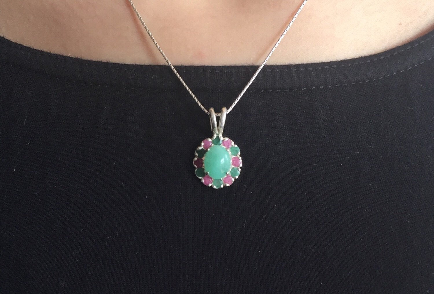 Elegant 925 Sterling Silver Emerald Pendant with oval green stone, ideal for May birthdays and meaningful gifting.