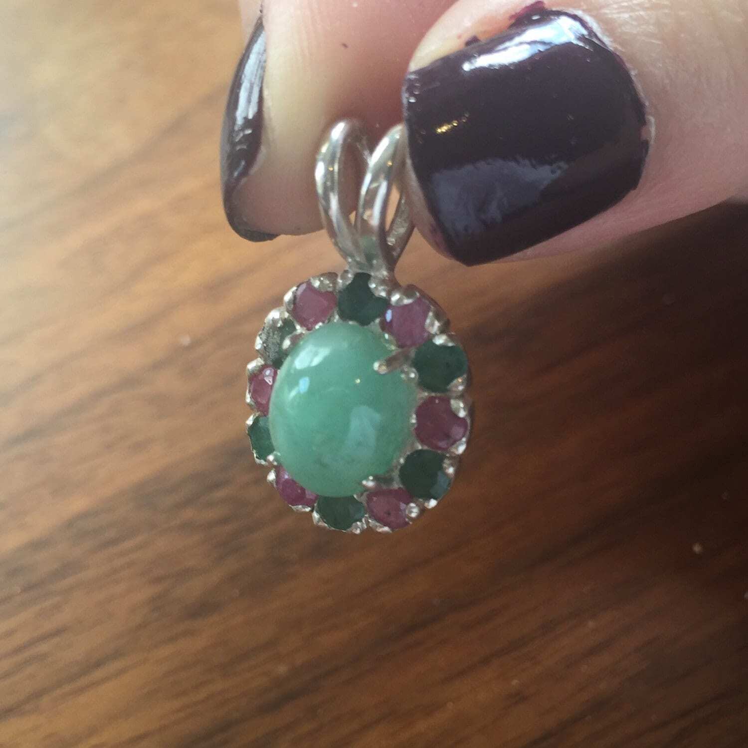 Natural Emerald Pendant made in 925 Sterling Silver with Oval Natural Green Emerald in Halo setting, May Birthstone gift idea, symbolizes growth, harmony, and deep emotional healing, ideal for everyday wear and perfect for birthday gifting and special occasions.