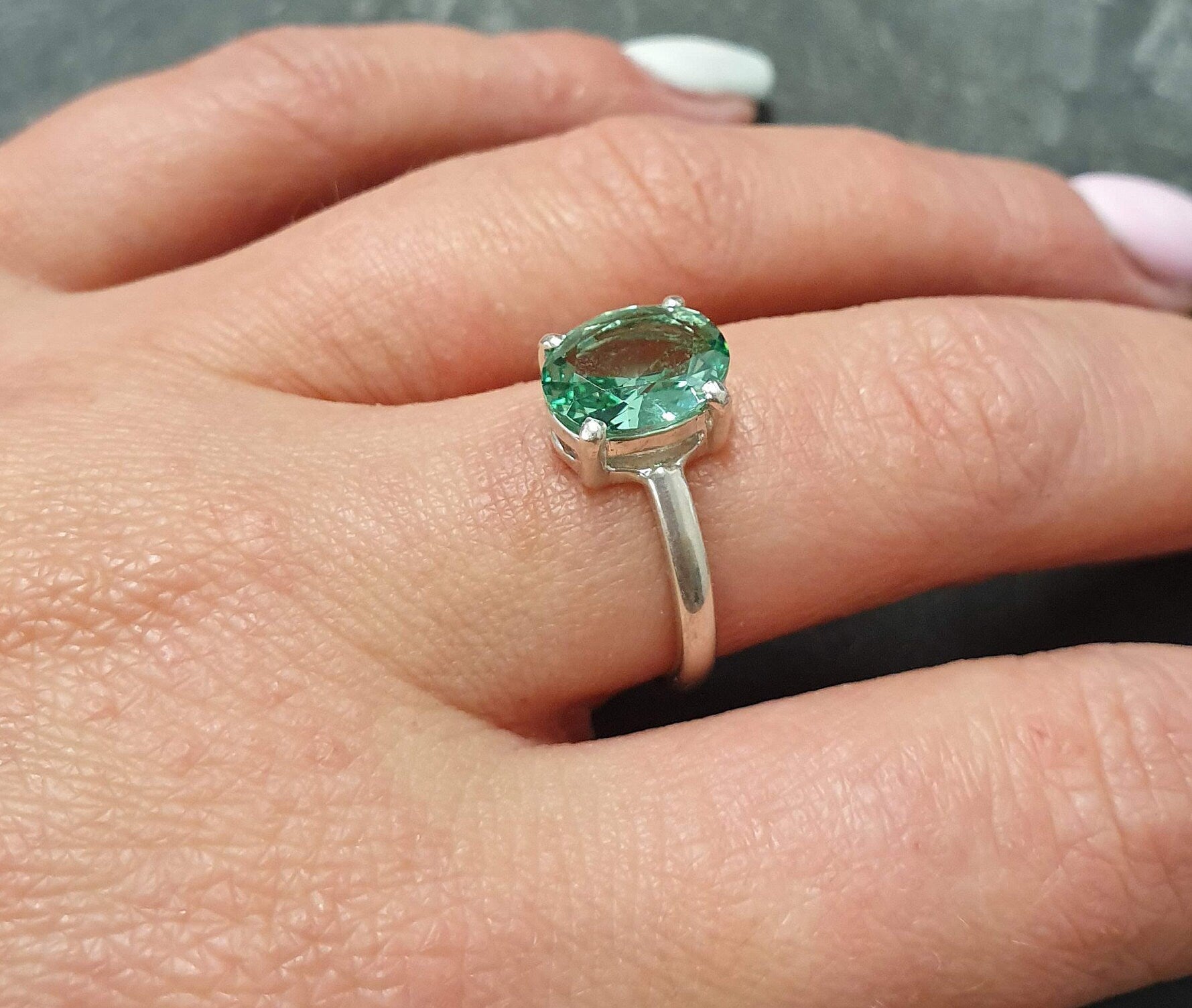 Delicate 925 Sterling Silver ring featuring a Created Mint Emerald, perfect for May birthdays and everyday elegance.