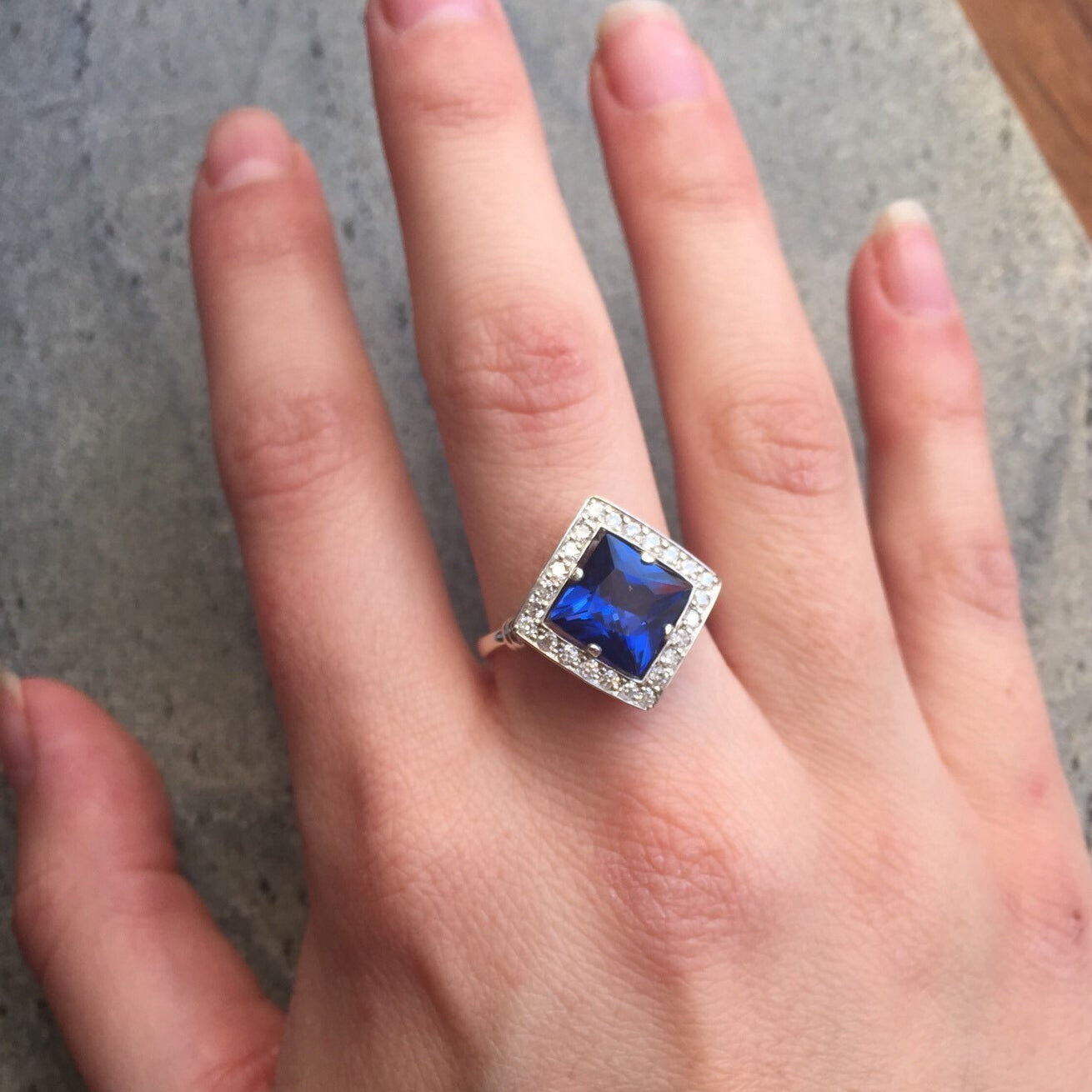 Elegant 925 Sterling Silver Sapphire Ring, halo setting with blue sapphire, perfect for birthdays and special occasions.