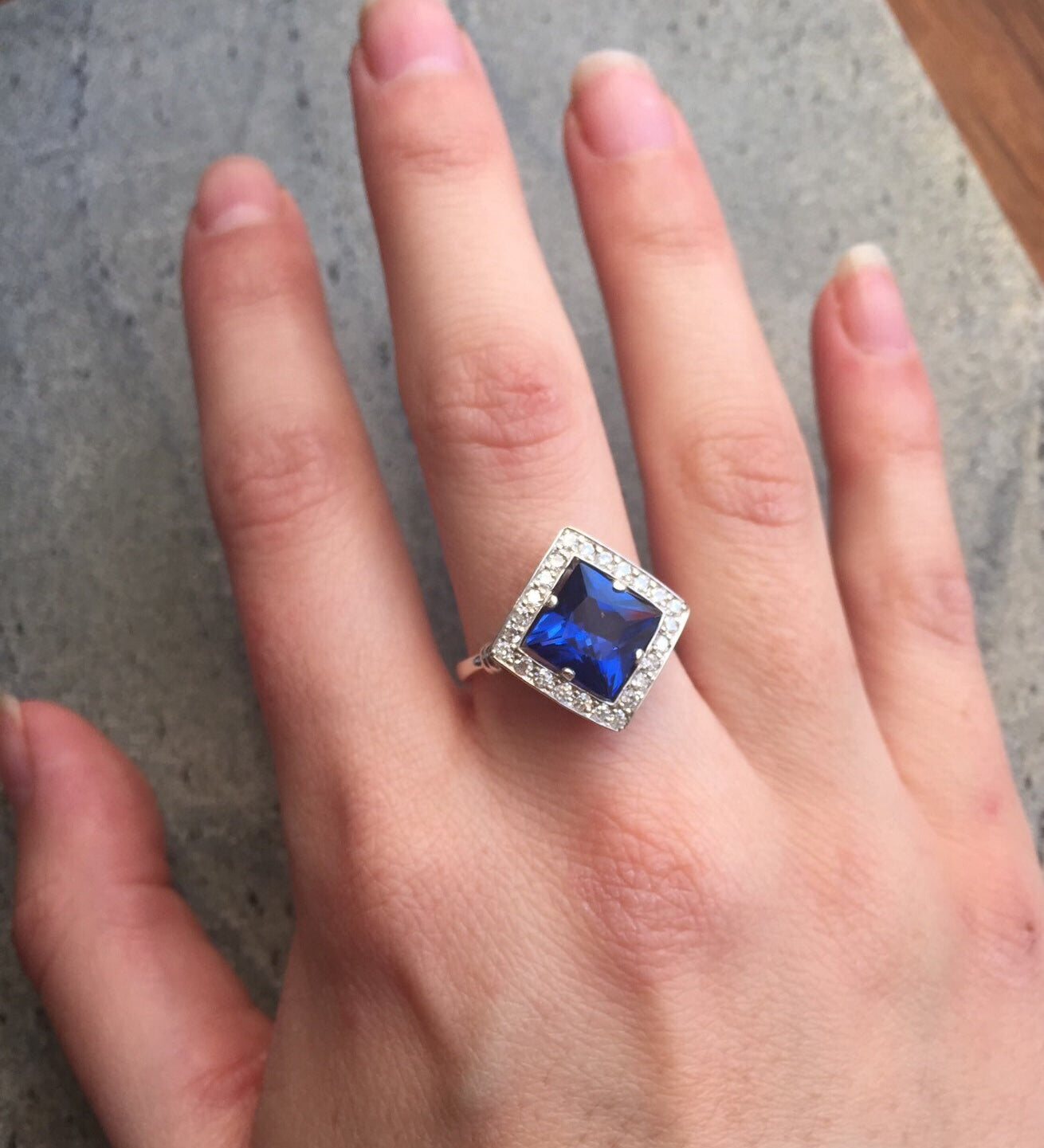 Elegant 925 Sterling Silver Sapphire Ring, halo setting with blue sapphire, perfect for birthdays and special occasions.