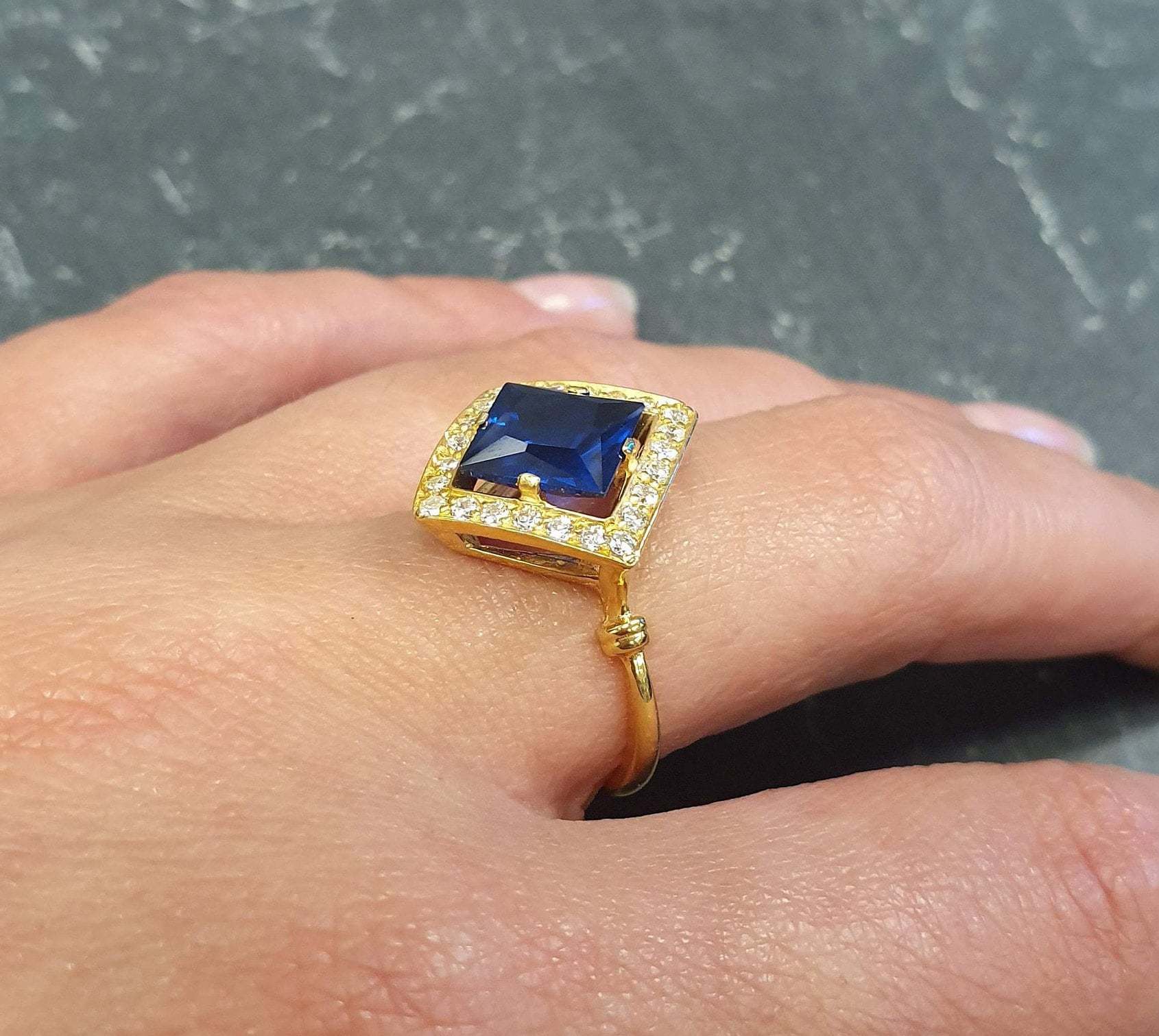 18k Gold Vermeil Sapphire Ring with Square Blue Sapphire in Halo setting, September birthstone, symbolizes sincerity and truth.