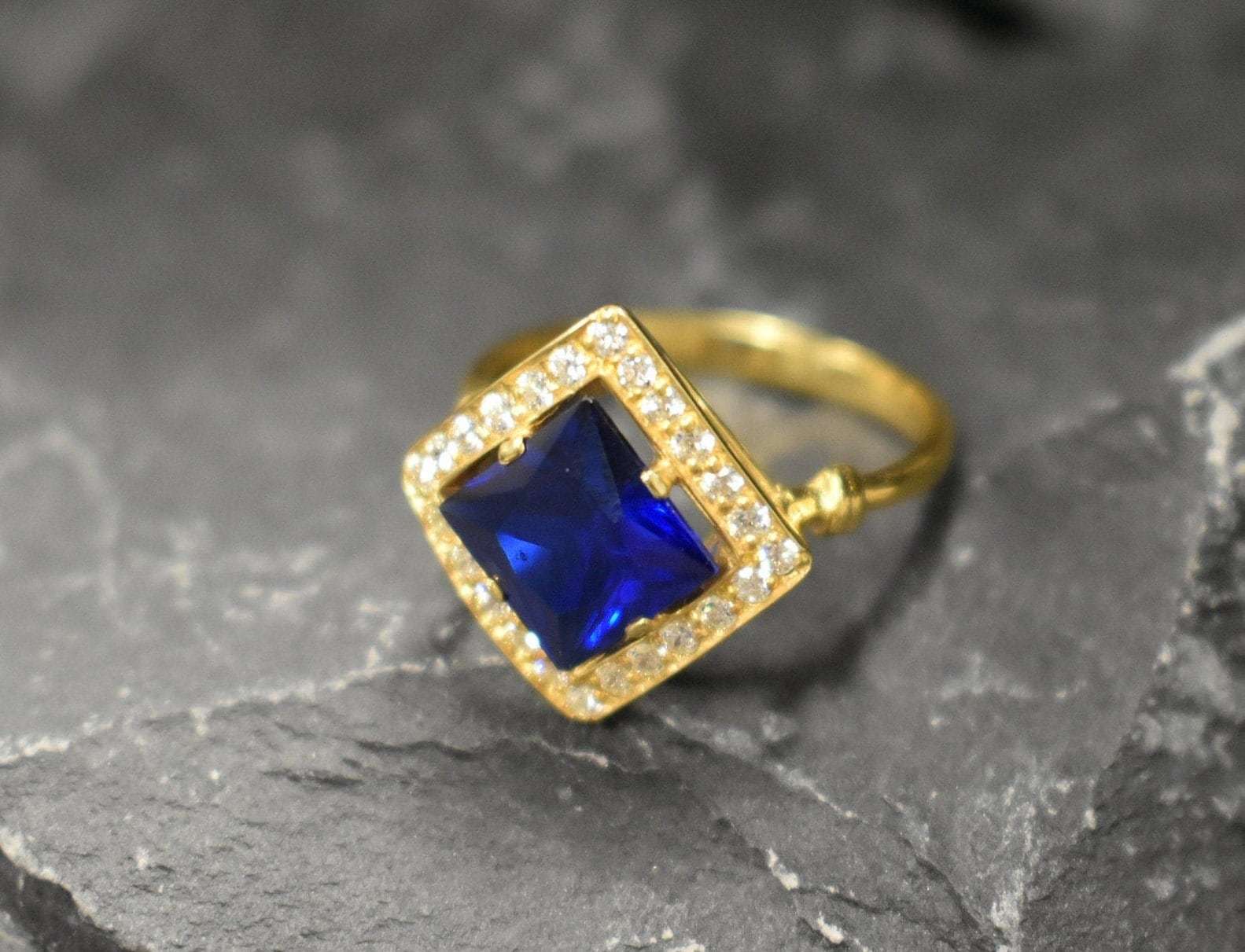 Created Sapphire Ring made in 18k Gold Vermeil with Square Created Blue Sapphire in Halo setting, September Birthstone gift idea, symbolizes sincerity, truth, and faithfulness, ideal for everyday wear and perfect for birthday gifting and special occasions.
