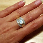 Sterling Silver Opal Ring with a shimmering white Opal, a thoughtful gift for special occasions and October birthdays.