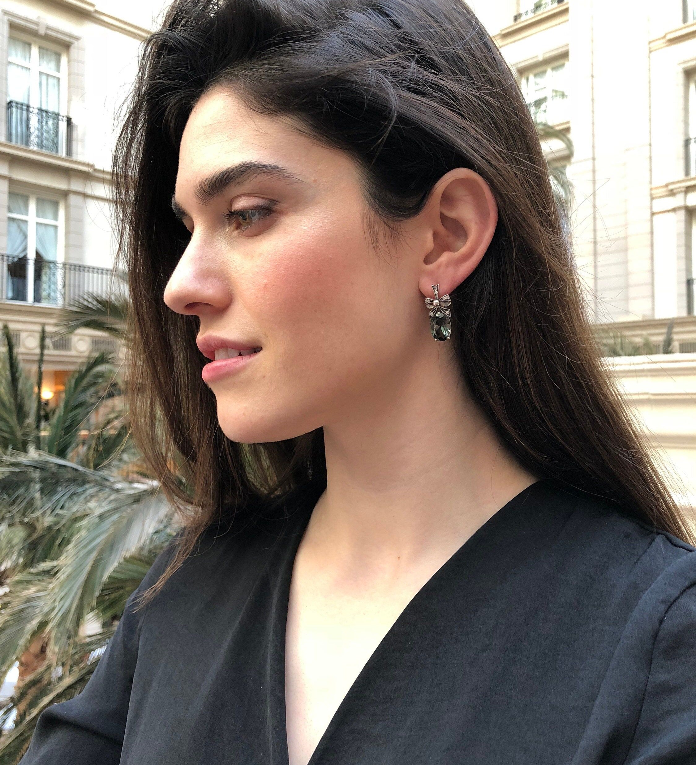 Created Sapphire Earrings in 925 Silver featuring an Oval Blue Sapphire, perfect as a September birthstone gift for special occasions.