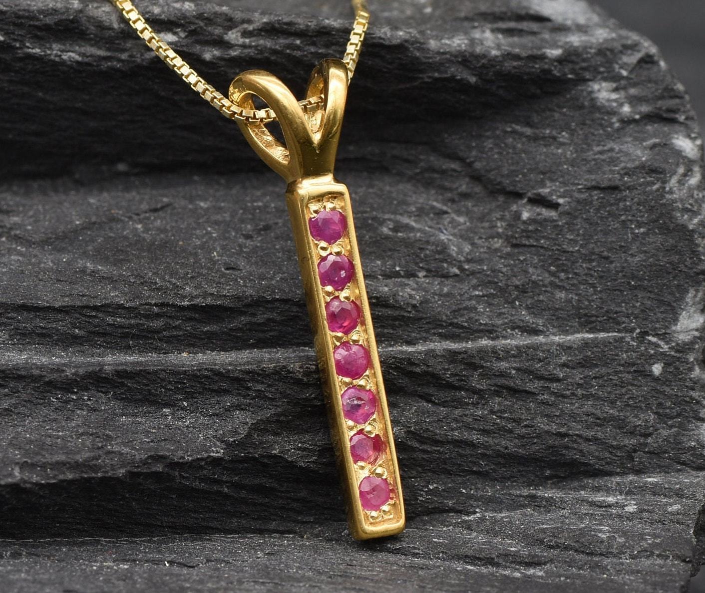 Natural Ruby Pendant made in 18k Gold Vermeil with Round Natural Red Ruby in Channel-Set setting, July Birthstone gift idea, symbolizes nobility, purity, and passion, ideal for everyday wear and perfect for birthday gifting and special occasions.