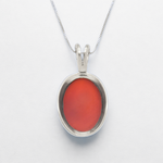 A stylish display of Adina Stone earrings in various shapes and colors, highlighting their unique designs and craftsmanship.