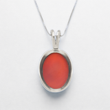 A stylish display of Adina Stone earrings in various shapes and colors, highlighting their unique designs and craftsmanship.