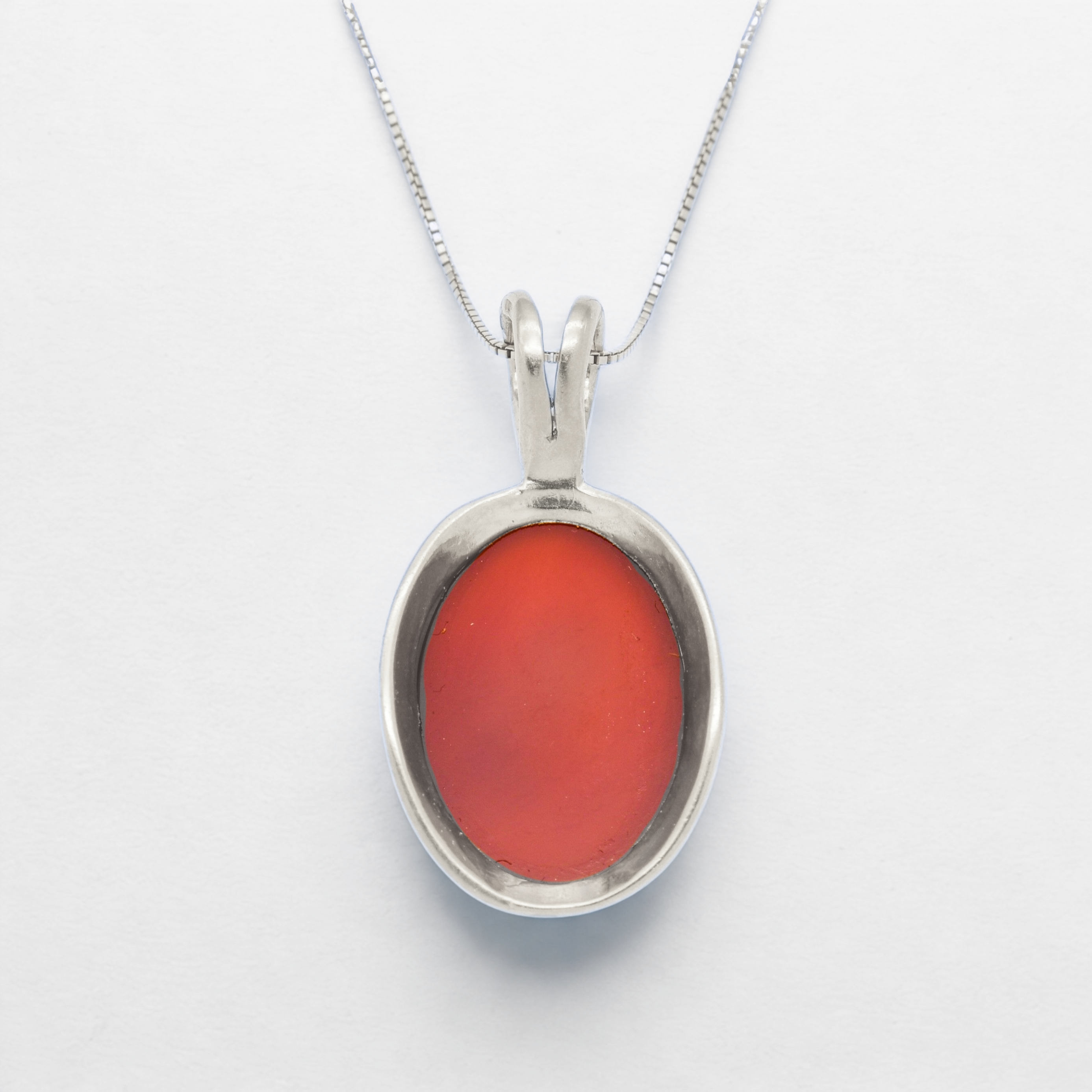 A stylish display of Adina Stone earrings in various shapes and colors, highlighting their unique designs and craftsmanship.