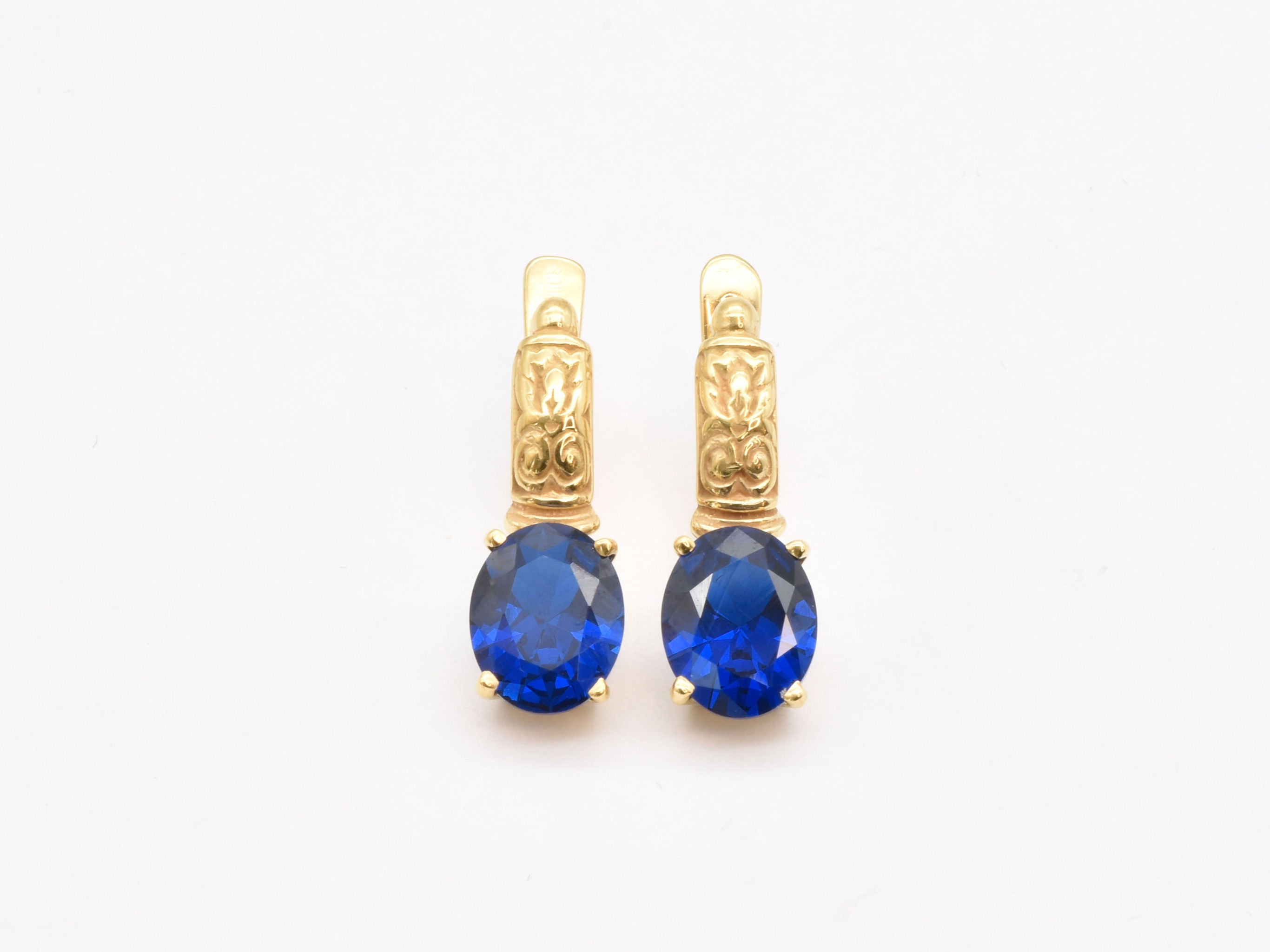 Created Sapphire Earrings made in 18k Gold Vermeil with Oval Created Blue Sapphire in Prong setting, September Birthstone gift idea, symbolizes sincerity, truth, and faithfulness, ideal for everyday wear and perfect for birthday gifting and special occasions.