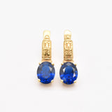 Created Sapphire Earrings made in 18k Gold Vermeil with Oval Created Blue Sapphire in Prong setting, September Birthstone gift idea, symbolizes sincerity, truth, and faithfulness, ideal for everyday wear and perfect for birthday gifting and special occasions.