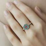 Elegant 925 Sterling Silver cluster ring featuring a genuine round green emerald, perfect for May birthdays and special occasions.