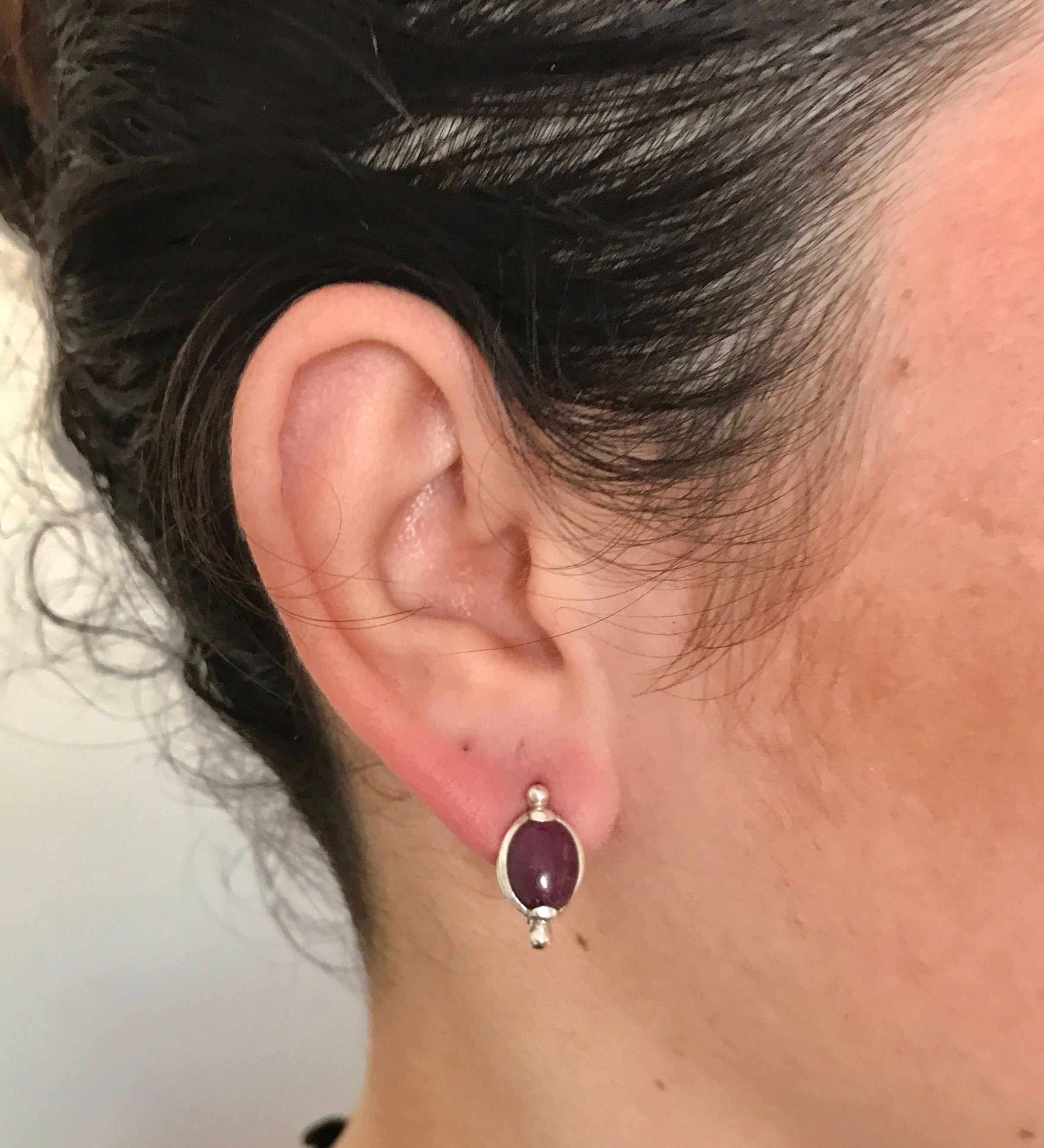 Elegant 925 Sterling Silver earrings with Oval Natural Ruby, July birthstone, perfect for birthdays and special occasions.