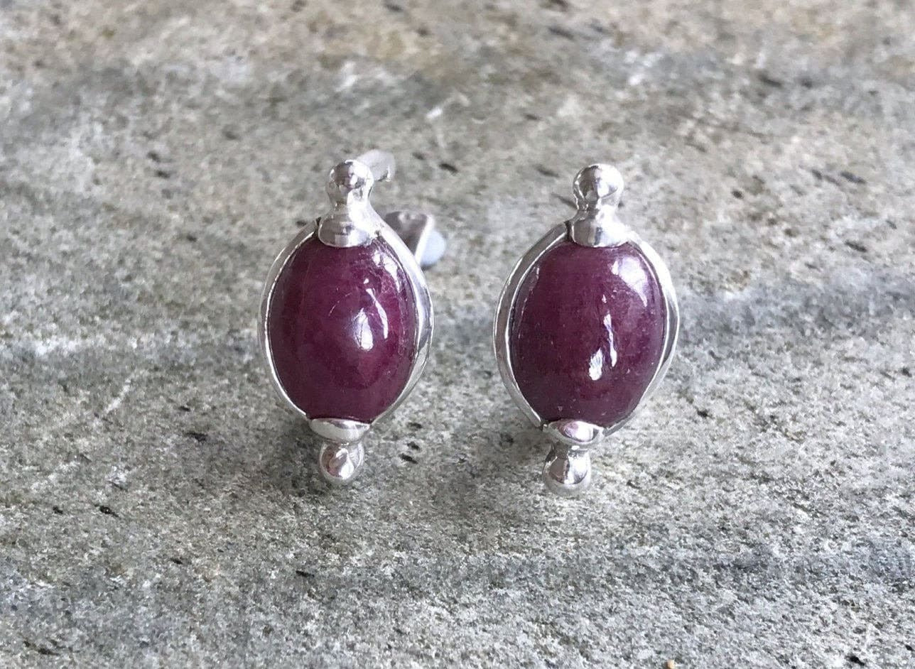 Natural Ruby Earrings made in 925 Sterling Silver with Oval Natural Red Ruby in Prong setting, July Birthstone gift idea, symbolizes nobility, purity, and passion, ideal for everyday wear and perfect for birthday gifting and special occasions.