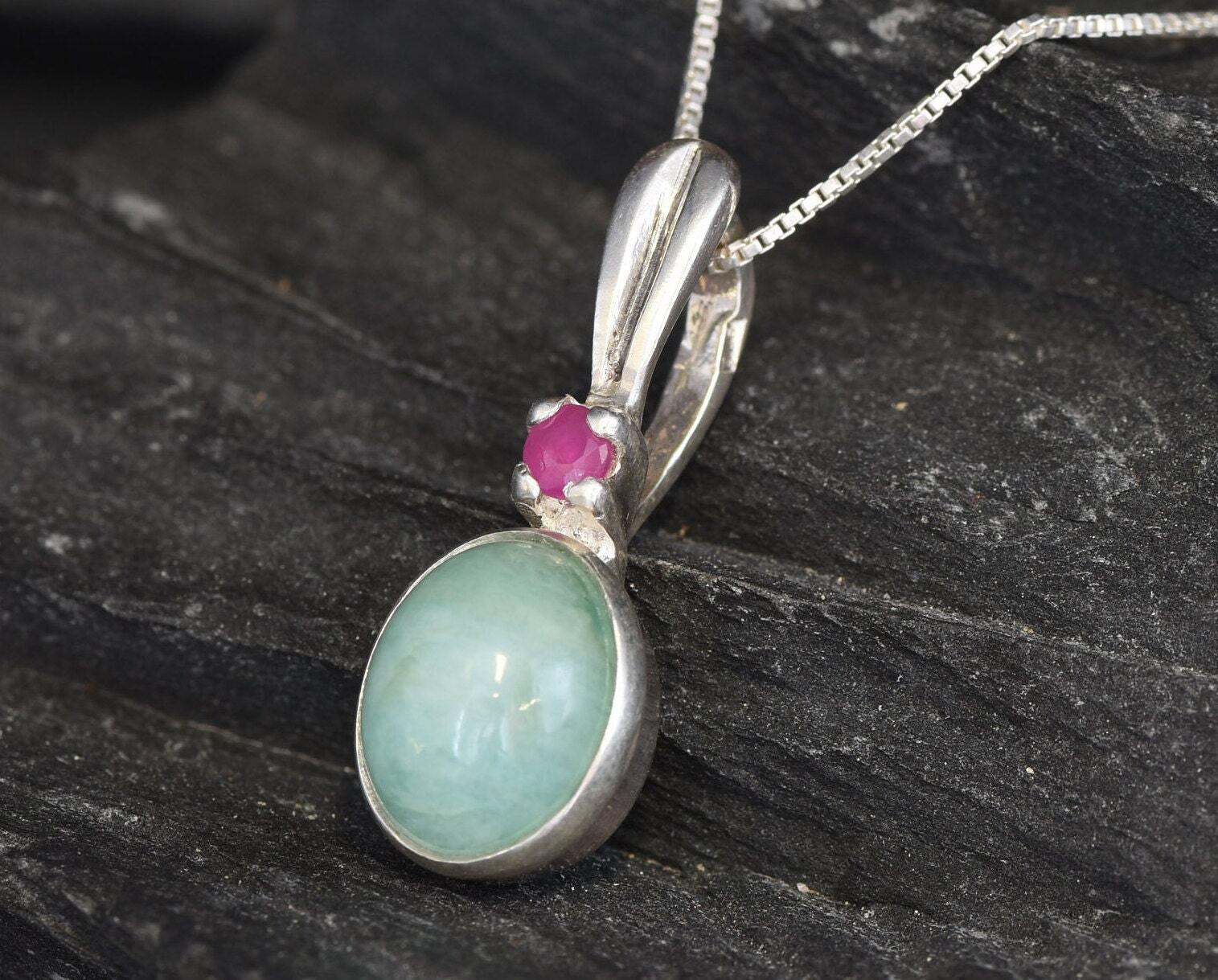 Stunning 925 Sterling Silver pendant featuring a natural green emerald, ideal gift for May birthdays and special occasions.