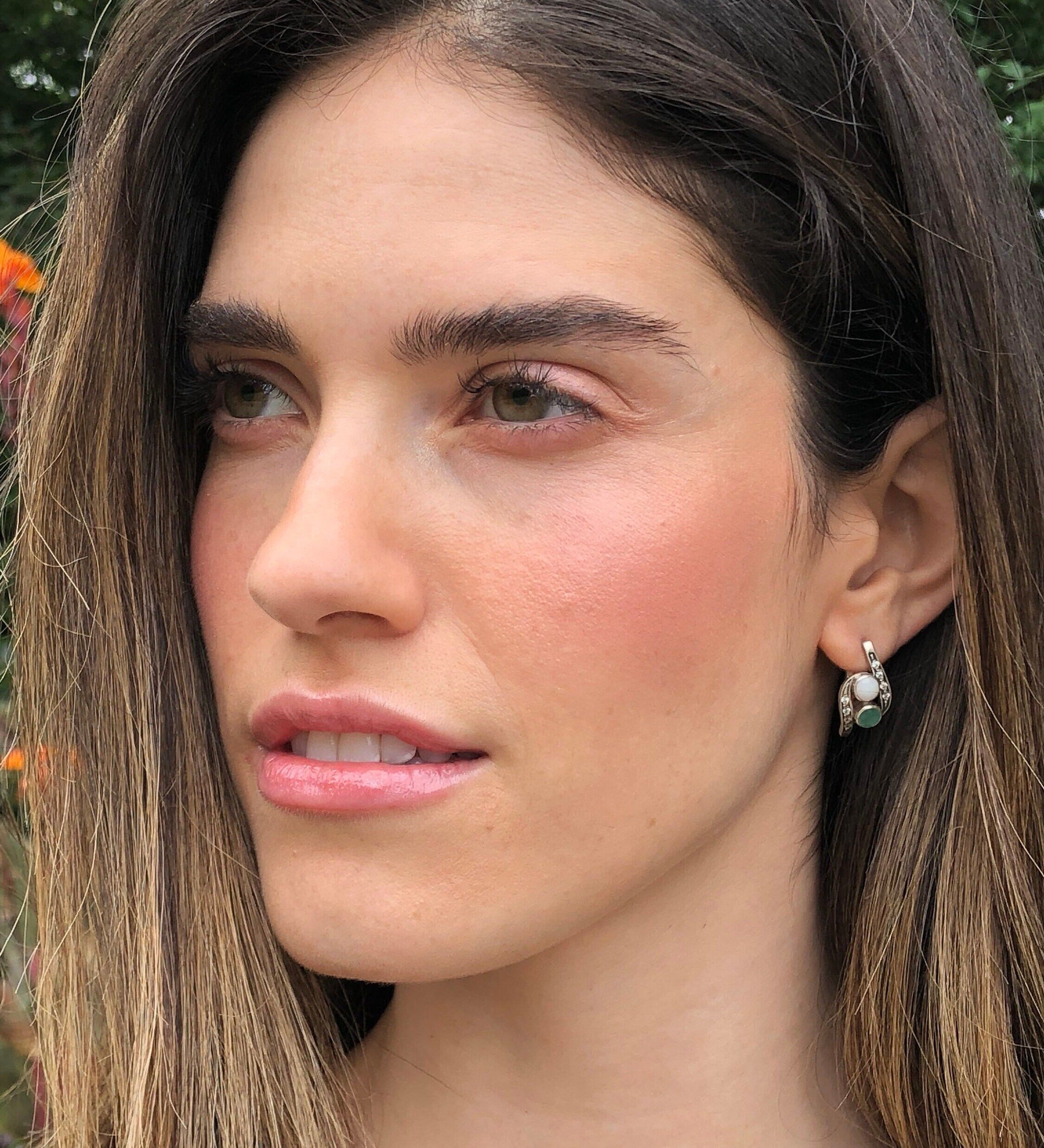 Elegant 925 Sterling Silver earrings featuring two round Natural Red Rubies, perfect for birthdays and special occasions.