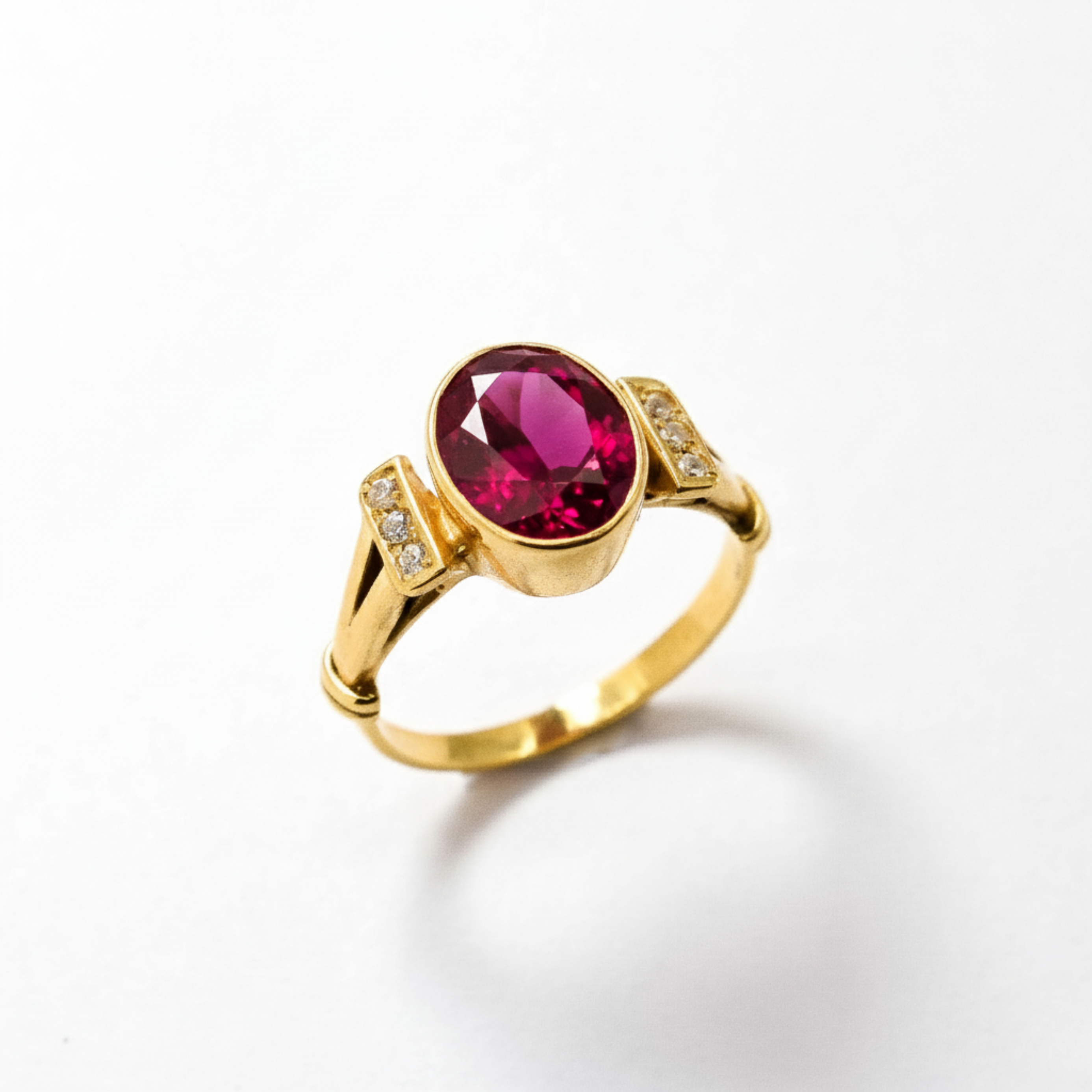 Stunning 18k Gold Vermeil ring with an oval created ruby, a vibrant choice for celebrations and everyday elegance.
