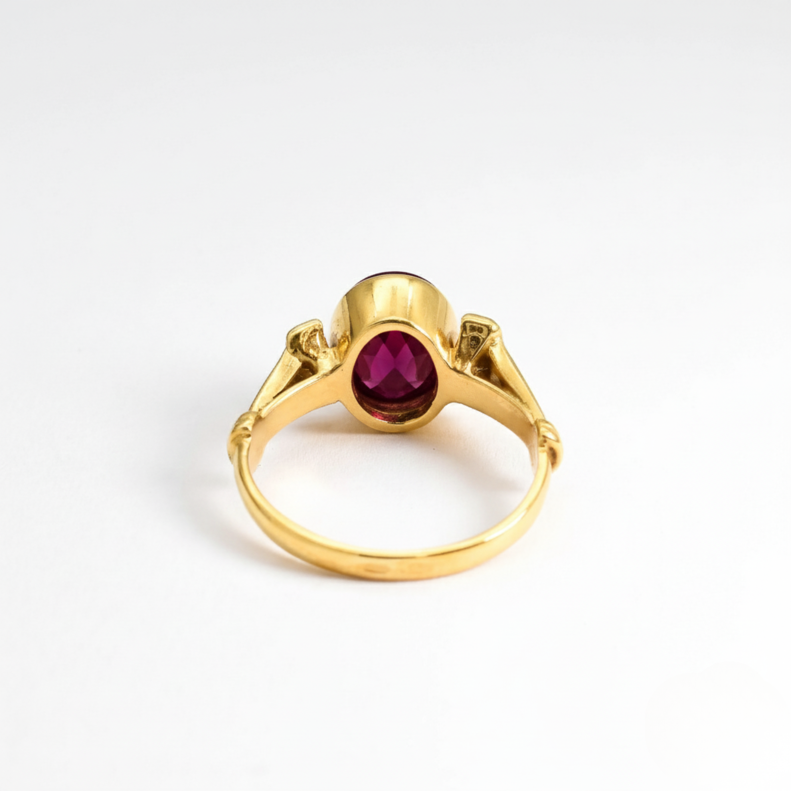 Radiant 18k Gold Vermeil ring set with an oval created ruby, a meaningful gift symbolizing passion and elegance for any occasion.