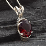 Beautiful Ruby Pendant in 925 Sterling Silver with an Oval Created Red Ruby, a meaningful gift for loved ones celebrating July birthdays.