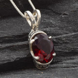 Beautiful Ruby Pendant in 925 Sterling Silver with an Oval Created Red Ruby, a meaningful gift for loved ones celebrating July birthdays.