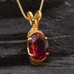 Elegant Ruby Pendant made of 18k Gold Vermeil with a stunning Oval Created Red Ruby, a perfect gift for July birthdays.