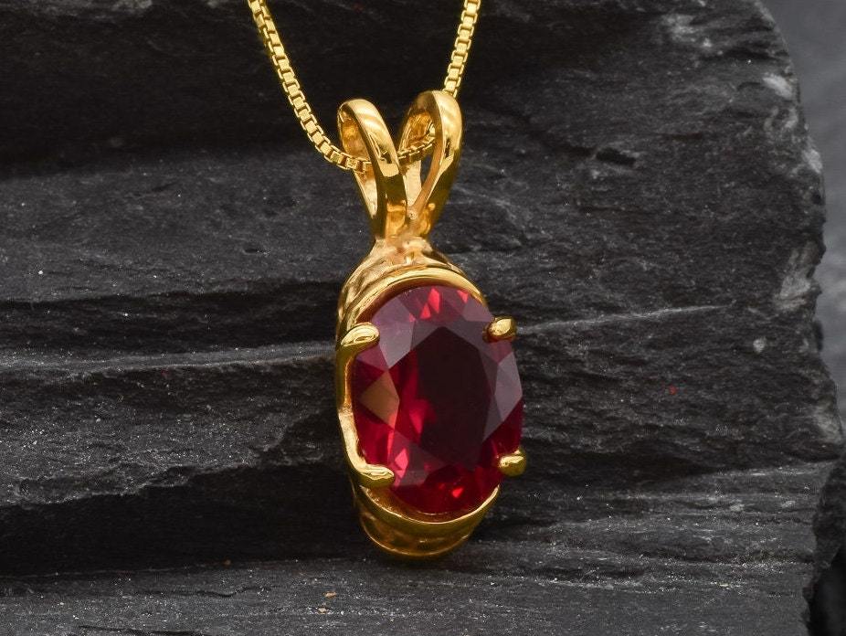 Elegant Ruby Pendant made of 18k Gold Vermeil with a stunning Oval Created Red Ruby, a perfect gift for July birthdays.