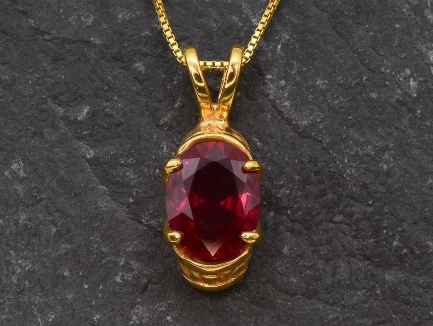 Stunning Ruby Pendant in 18k Gold Vermeil, showcasing an Oval Created Red Ruby, ideal for daily wear and meaningful gifting.
