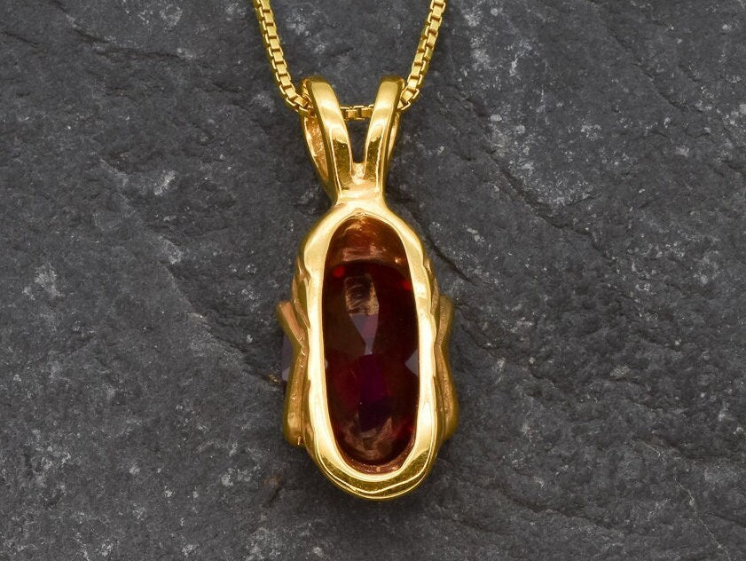 Luxurious Ruby Pendant in 18k Gold Vermeil with Oval Created Red Ruby, a timeless piece for special occasions and daily style.