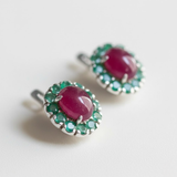 Stylish Sterling Silver Ruby Earrings with Oval Red Gemstones, ideal for daily wear and memorable gifts for loved ones.