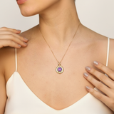 Amethyst pendant crafted in 18k gold vermeil, featuring a round purple amethyst, perfect for everyday elegance and special gifting.