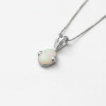 Stylish 925 Sterling Silver Opal Pendant featuring genuine Australian Opal, ideal birthday gift, symbolizes purity and truth.