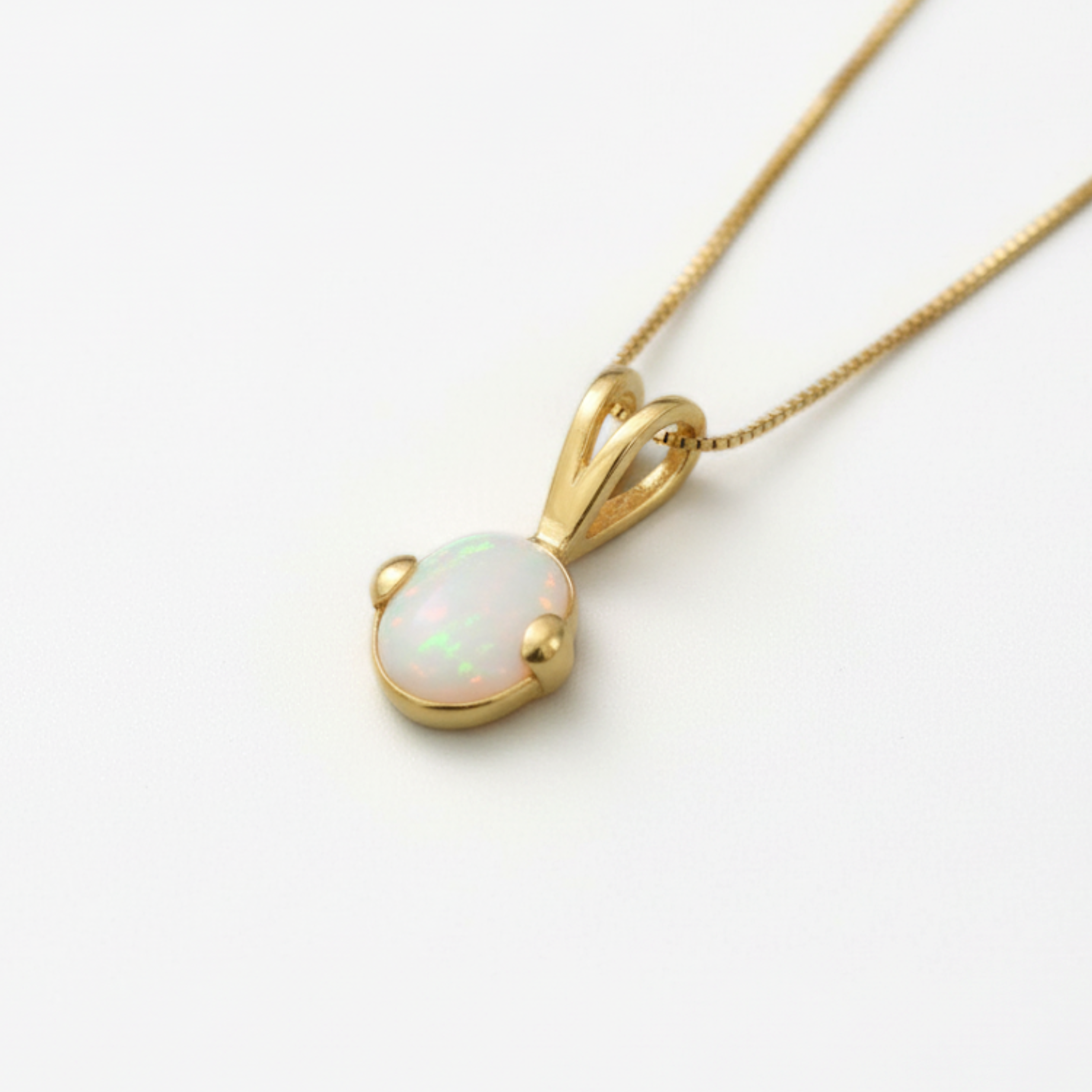 Beautifully crafted 18k Gold Vermeil Opal Pendant, a timeless gift representing purity and ideal for October birthdays.