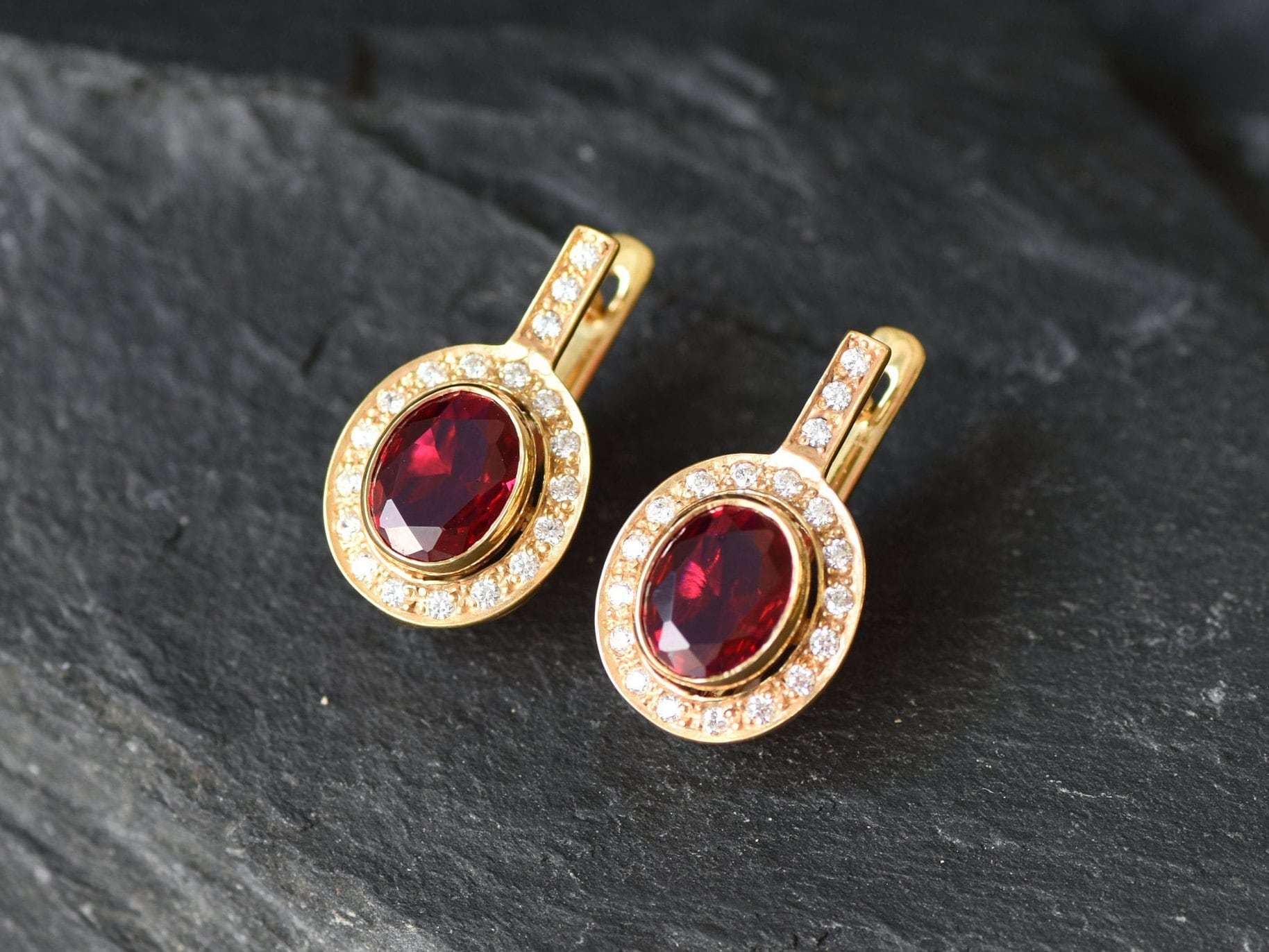 Created Ruby Earrings made in 18k Gold Vermeil with Oval Created Red Ruby in Bezel setting, July Birthstone gift idea, symbolizes nobility, purity, and passion, ideal for everyday wear and perfect for birthday gifting and special occasions.